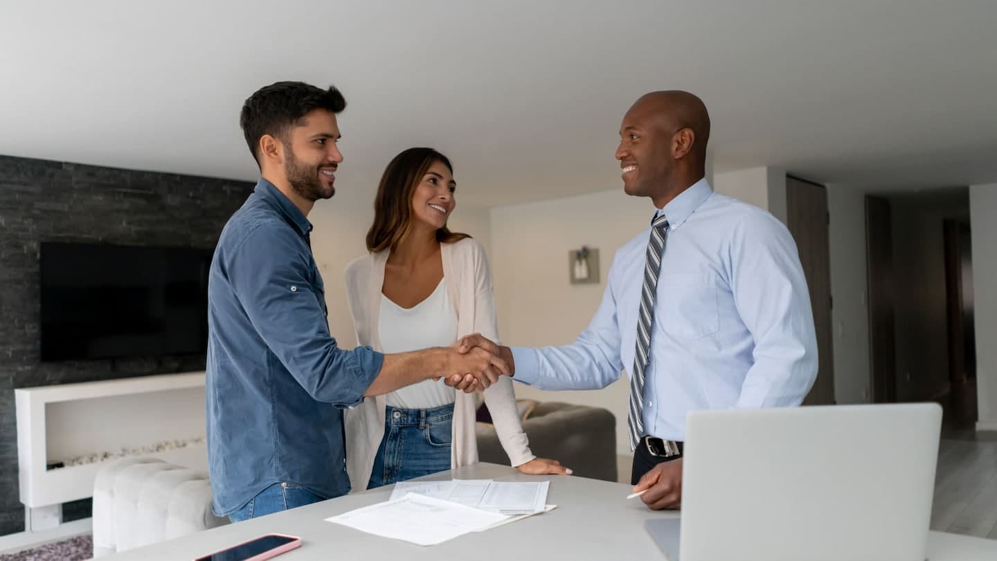 Commercial real estate refinancing meeting — BRRRR method Step 4 Refinance to recapture investment capital