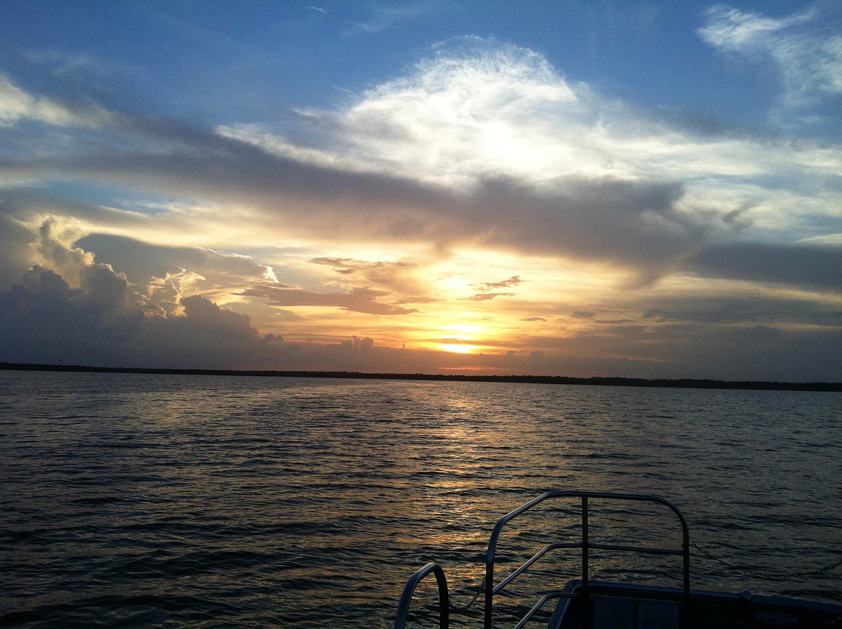 Sunset over Lake Jesup from a boat, Oviedo, Florida