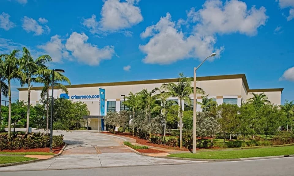 Modern industrial warehouse and logistics facility — Orlando Airport Southeast corridor commands $9.50–$11.50/SF NNN asking rents