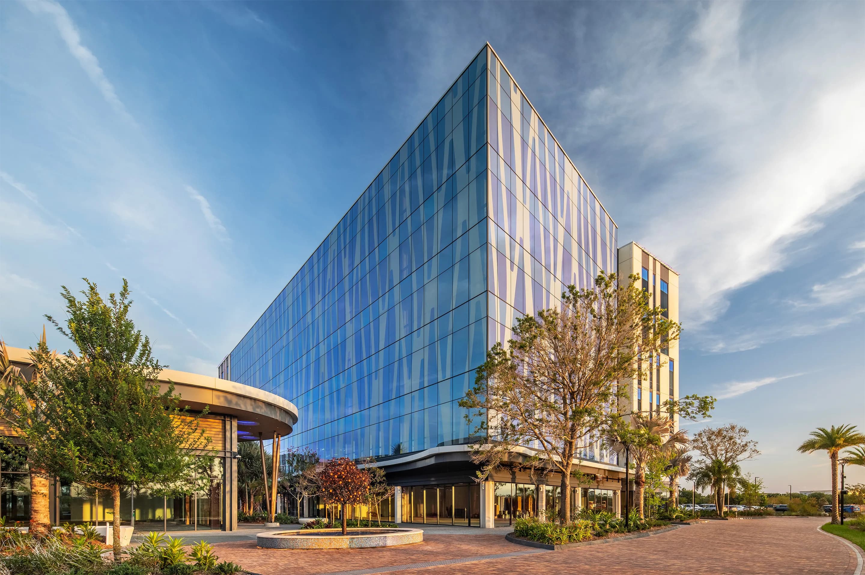 Lake Nona Town Center in southeast Orlando with modern Class A WELL-certified office buildings, pedestrian walkways, and master-planned community architecture