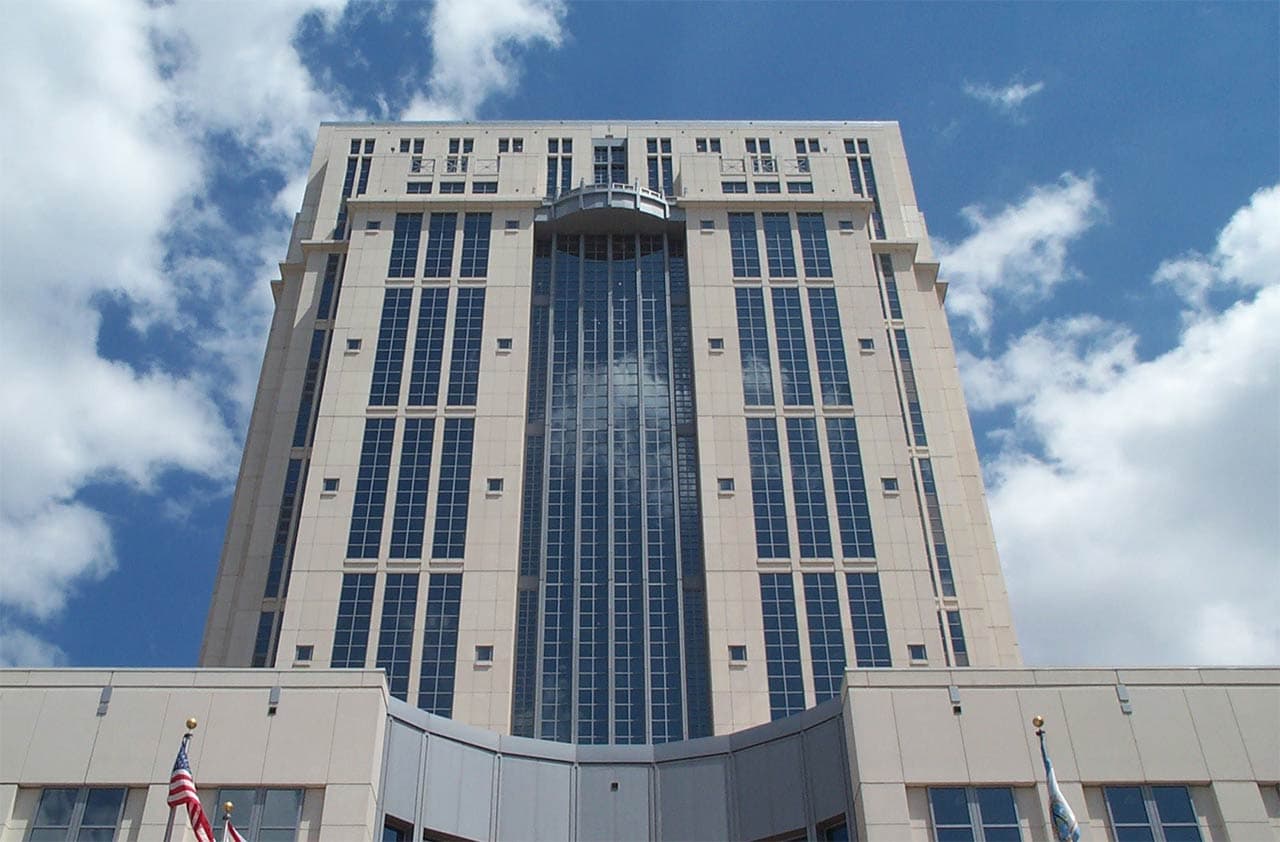 Orange County Courthouse in downtown Orlando, a modern government building rising approximately 416 feet shaping the western edge of the CBD