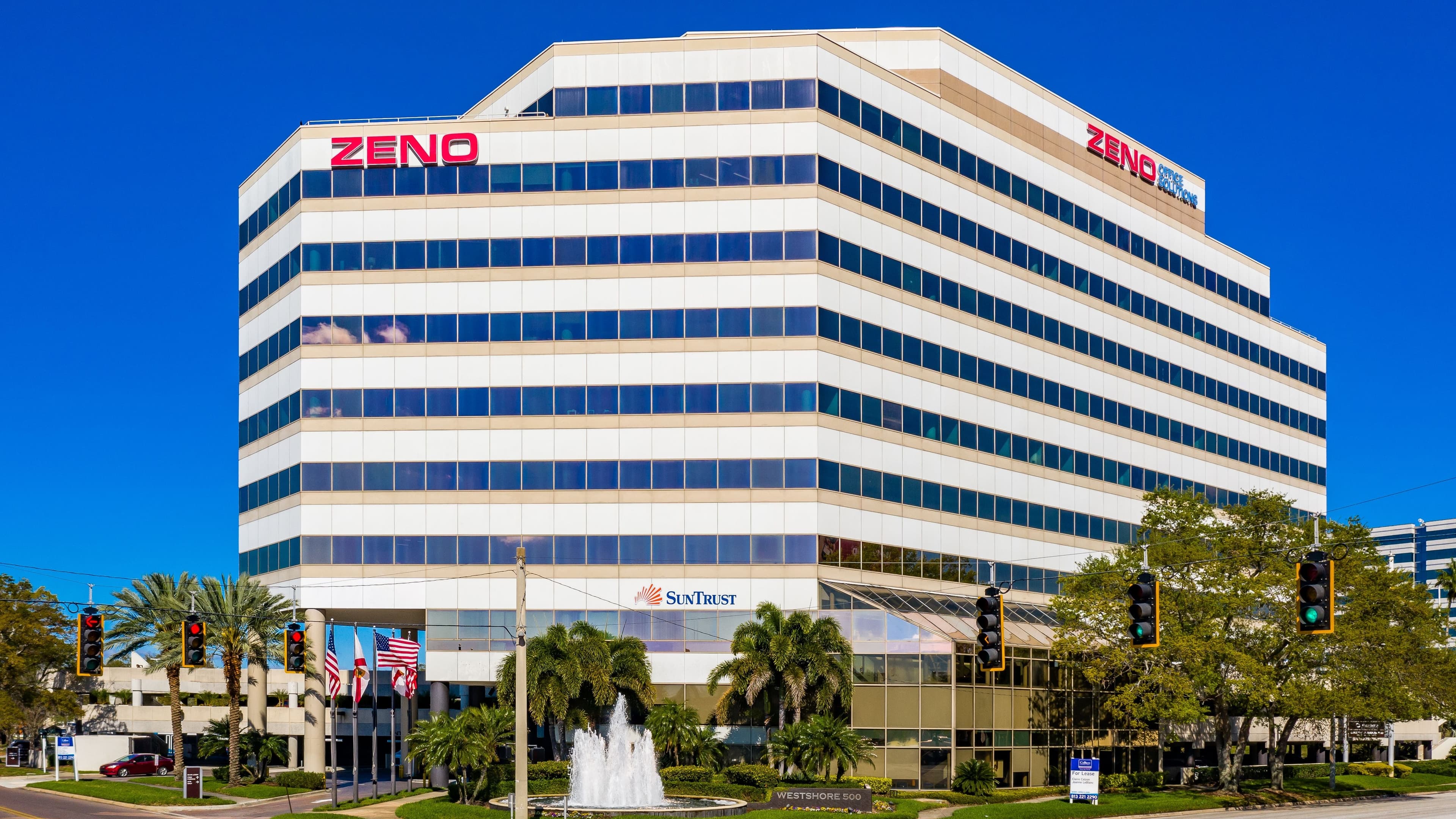 Westshore Business District office buildings near Tampa International Airport with palm trees and clear Florida sky