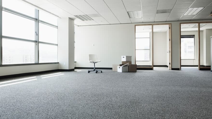 Empty vacant office space interior representing the office vacancy crisis